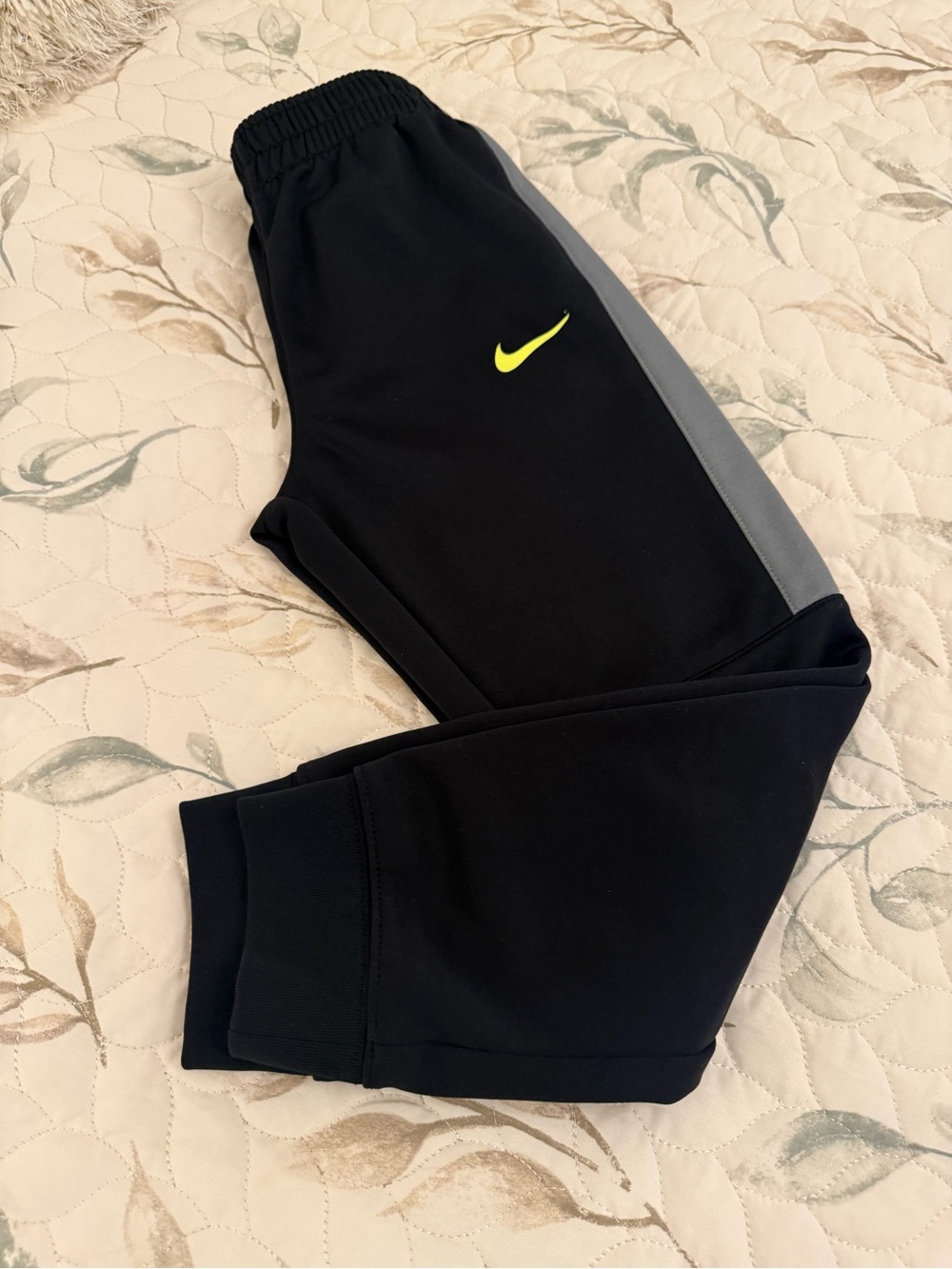 Nike Kids Black Joggers with Grey Side Panel and Neon Yellow Swoosh boy size 7 .